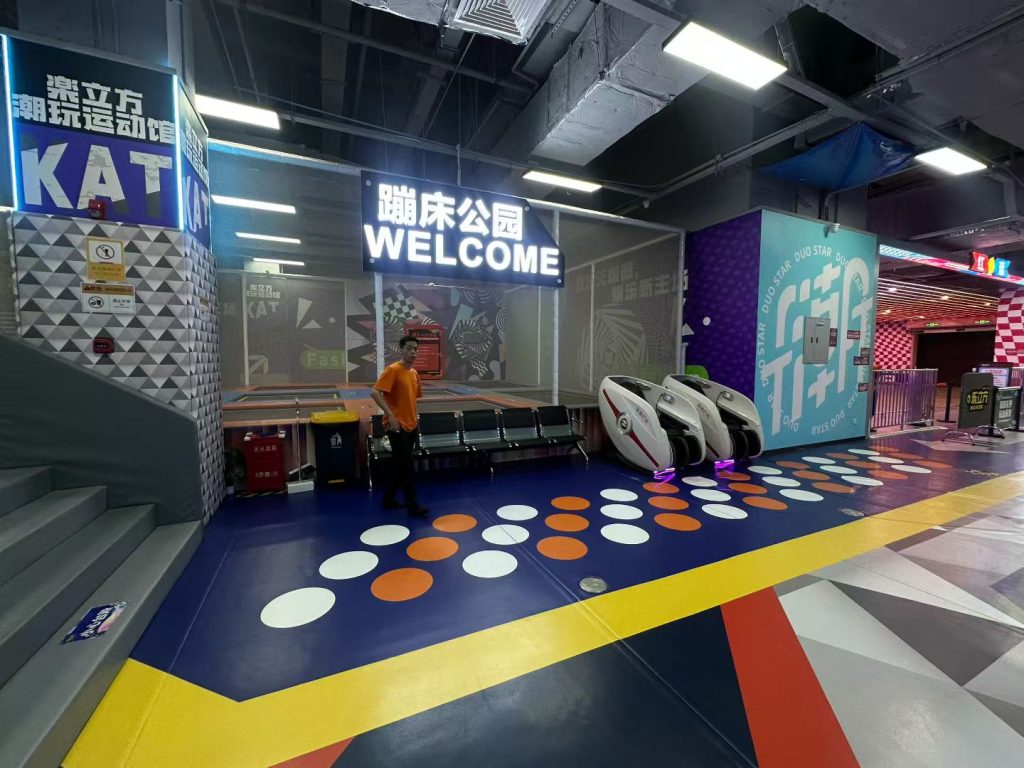 Trampoline park welcome entrance area with reception desk - GO2AMUSE