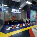 Trampoline park welcome entrance area with reception desk - GO2AMUSE