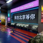 Modern rest area with trendy seating and Beijing themed wall art - GO2AMUSE