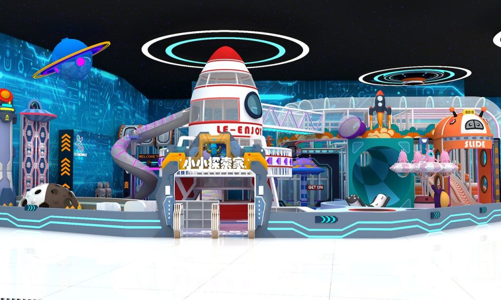 Front view of space themed indoor playground showing rocket ship centerpiece